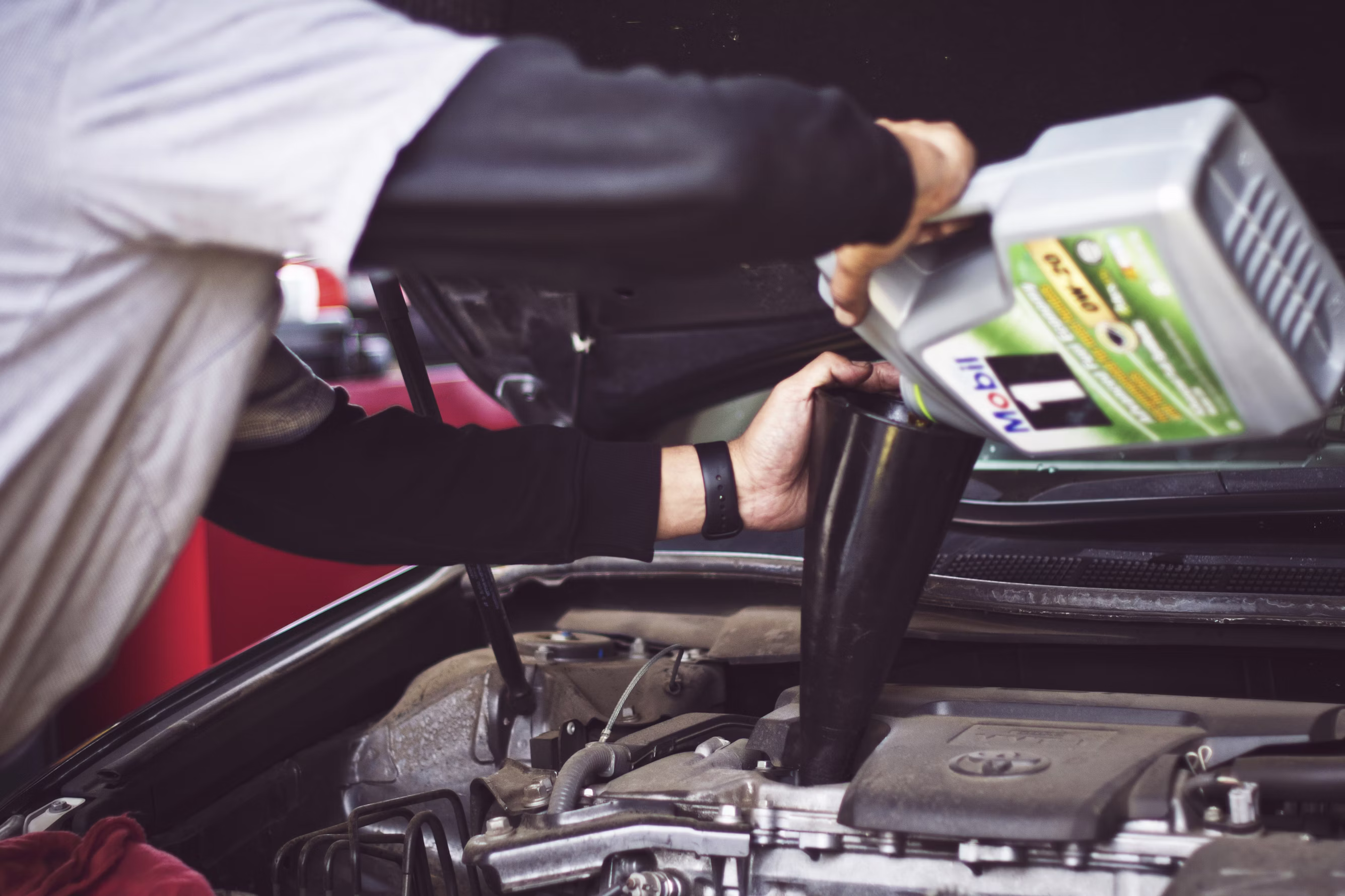 Anu Car Repair technician performing service