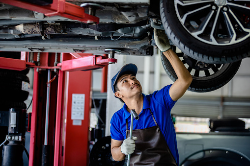 Service advisor reviewing repairs with a customer