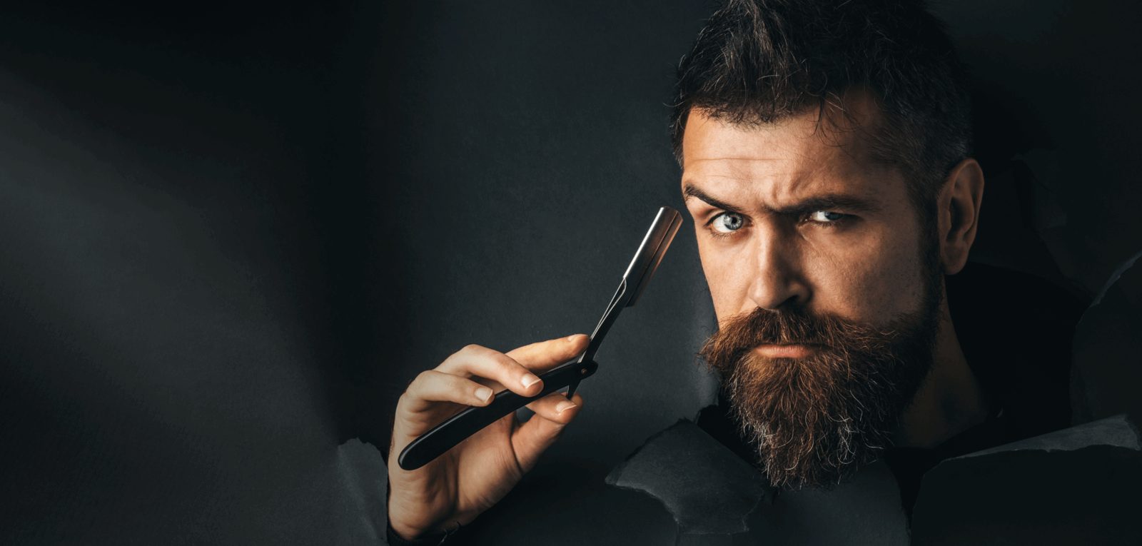 Barber giving a client a fresh cut